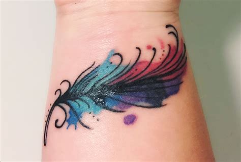 feather tattoo designs|beautiful feather tattoo designs.